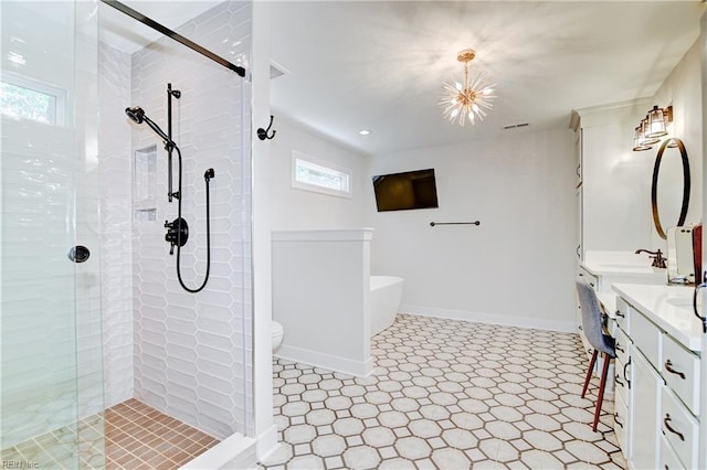 5227 Lake Shores Rd, Virginia Beach, VA 23455 - full bath featuring tile patterned floors, double vanity, a freestanding tub, and a stall shower