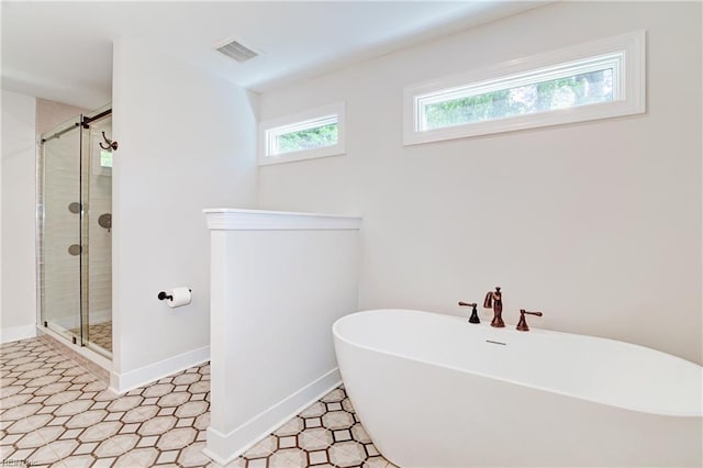 5227 Lake Shores Rd, Virginia Beach, VA 23455 - full bath with a freestanding tub and a stall shower
