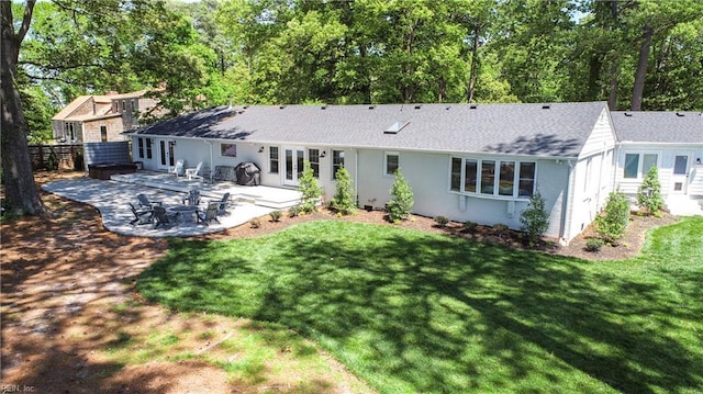 5227 Lake Shores Rd, Virginia Beach, VA 23455 - back of property with a patio area and a shingled roof