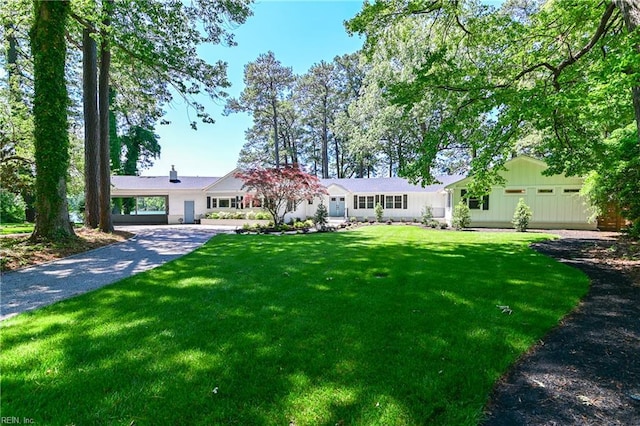 5227 Lake Shores Rd, Virginia Beach, VA 23455 - ranch-style home featuring a front lawn and driveway