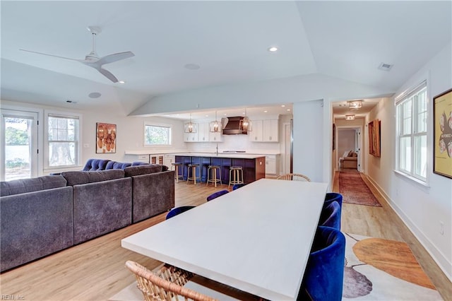 5227 Lake Shores Rd, Virginia Beach, VA 23455 - dining space with lofted ceiling, light wood-style flooring, and ceiling fan