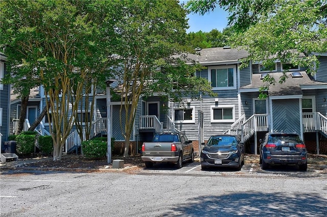 1118 Glengarry Way, Virginia Beach, VA 23451 - view of property featuring uncovered parking and a shingled roof