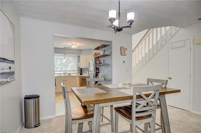 1118 Glengarry Way, Virginia Beach, VA 23451 - dining area featuring stairway, light colored carpet, and a chandelier