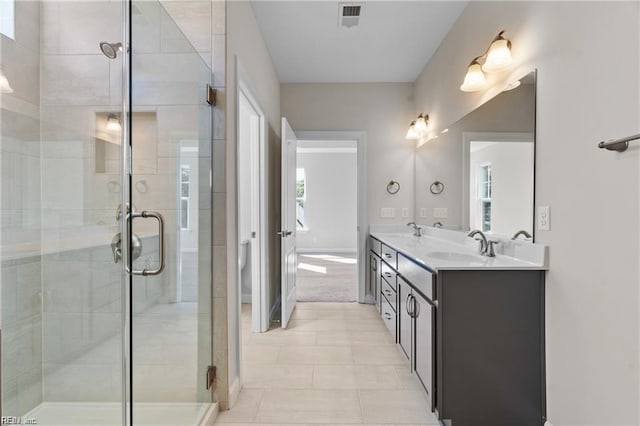 242 Quarter Horse Loop, Hertford, NC 27944 - full bath with double vanity, a stall shower, and tile patterned flooring