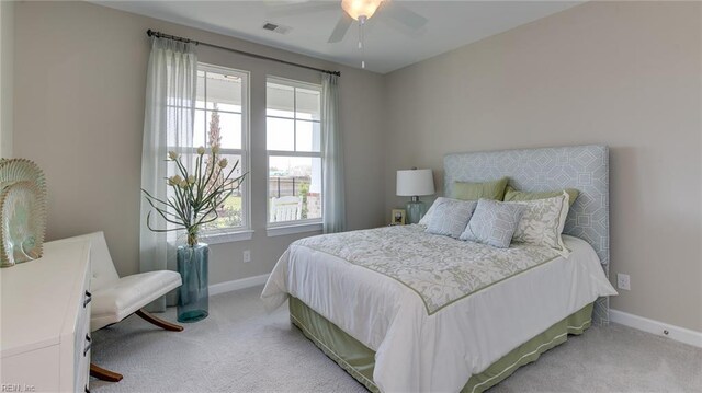 242 Quarter Horse Loop, Hertford, NC 27944 - bedroom featuring light colored carpet and a ceiling fan