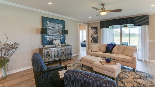 242 Quarter Horse Loop, Hertford, NC 27944 - living room featuring crown molding, wood finished floors, ceiling fan, and recessed lighting