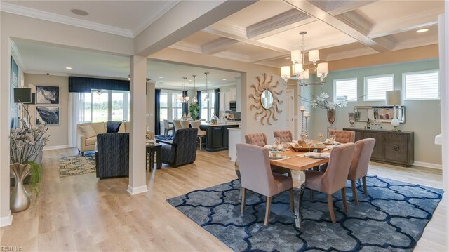 242 Quarter Horse Loop, Hertford, NC 27944 - dining room featuring a chandelier, beam ceiling, ornamental molding, light wood finished floors, and coffered ceiling