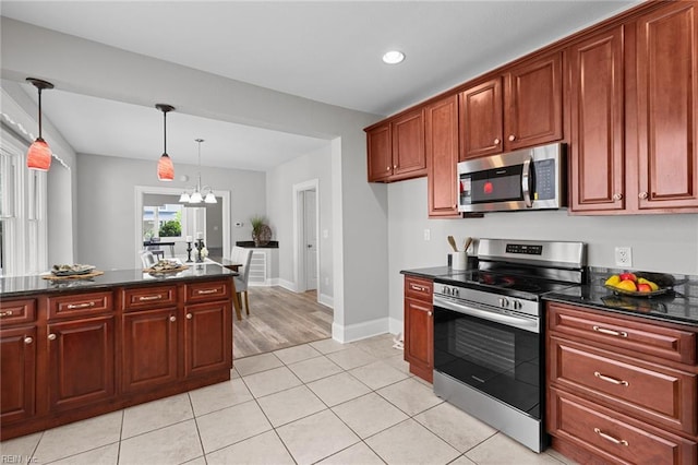 2724 Kimball Ter, Norfolk, VA 23504 - kitchen with stainless steel appliances, a chandelier, hanging light fixtures, light tile patterned floors, and recessed lighting