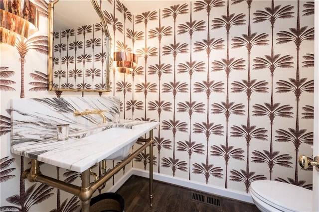 209 44th St, Virginia Beach, VA 23451 - half bathroom with wood finished floors and wallpapered walls