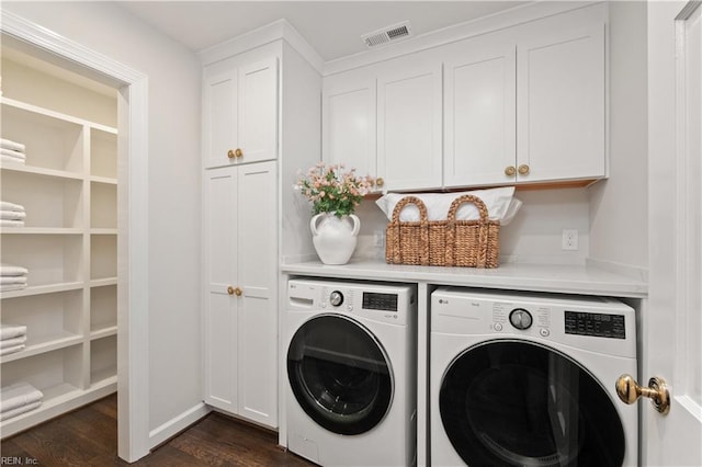 209 44th St, Virginia Beach, VA 23451 - laundry room with cabinet space, independent washer and dryer, and dark wood-style flooring