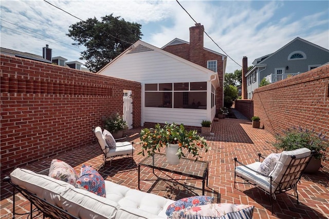 209 44th St, Virginia Beach, VA 23451 - view of patio with an outdoor hangout area and a sunroom