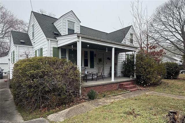 5214 Norvella Ave, Norfolk, VA 23513 - view of front facade featuring covered porch and a shingled roof