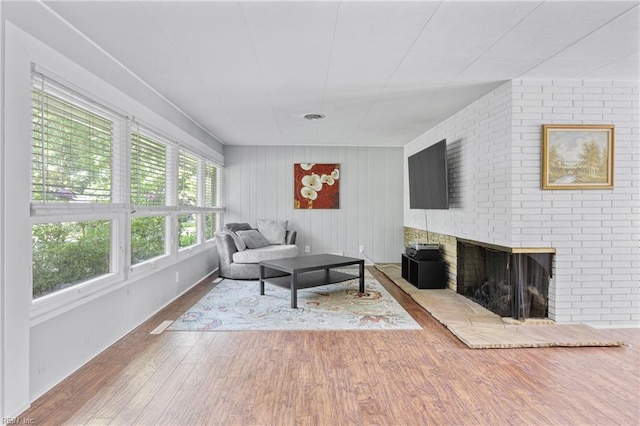 2 Sir Francis Wyatt Pl, Newport News, VA 23606 - living area with wood finished floors and a brick fireplace