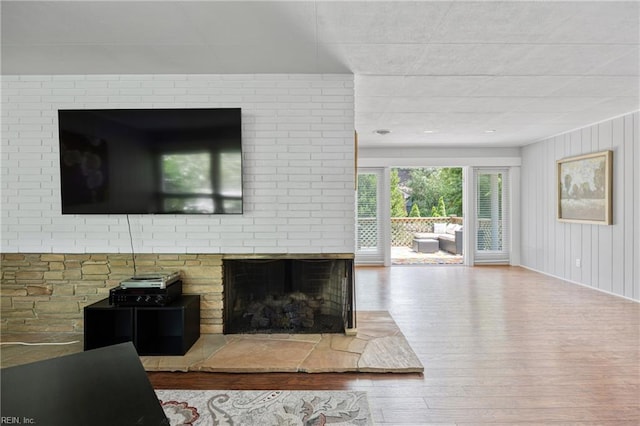 2 Sir Francis Wyatt Pl, Newport News, VA 23606 - living room with hardwood / wood-style flooring and a brick fireplace