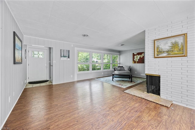 2 Sir Francis Wyatt Pl, Newport News, VA 23606 - living area with wood finished floors and a brick fireplace