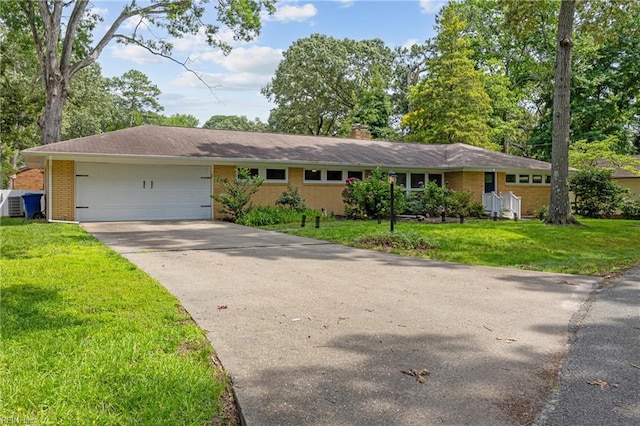 2 Sir Francis Wyatt Pl, Newport News, VA 23606 - ranch-style home featuring driveway, brick siding, a garage, a front yard, and a chimney