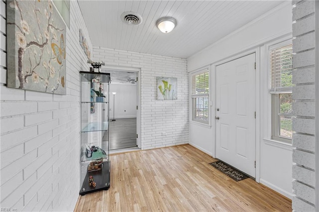 2 Sir Francis Wyatt Pl, Newport News, VA 23606 - entrance foyer featuring brick wall, wood finished floors, and wooden ceiling