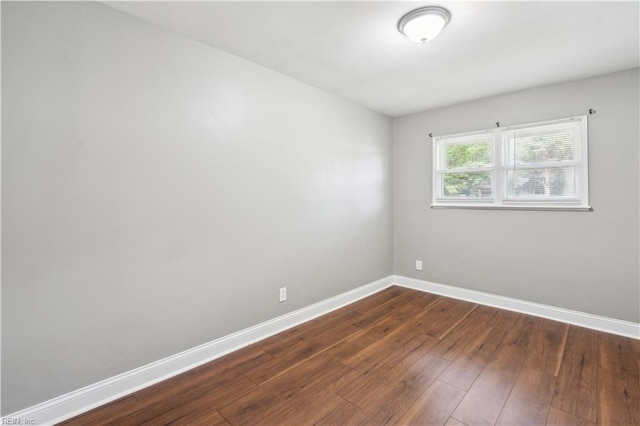 504 Day St, Hampton, VA 23661 - empty room with baseboards and dark wood-style floors