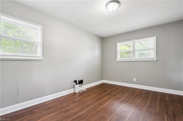 504 Day St, Hampton, VA 23661 - empty room featuring dark wood finished floors and baseboards