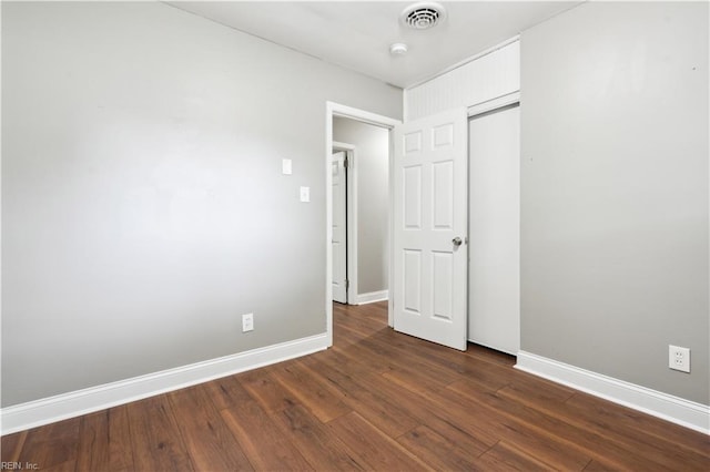 504 Day St, Hampton, VA 23661 - empty room with baseboards and dark wood-style flooring
