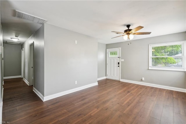 504 Day St, Hampton, VA 23661 - spare room featuring a ceiling fan and dark wood-style floors
