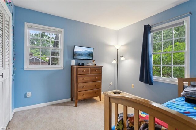155 Wilderness Rd, Hampton, VA 23669 - bedroom with light colored carpet and multiple windows