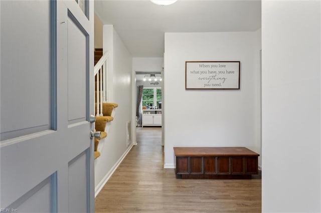 155 Wilderness Rd, Hampton, VA 23669 - corridor featuring light wood finished floors and baseboards
