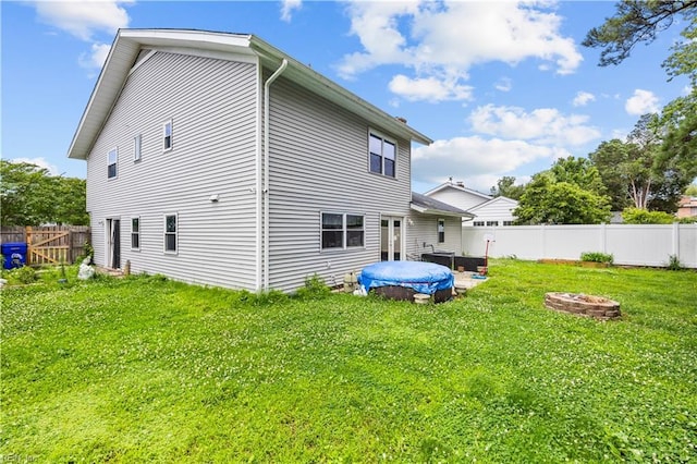 1236 Ginger Crst, Virginia Beach, VA 23453 - back of house with a hot tub and a fenced backyard