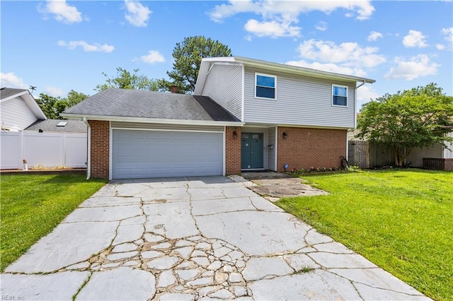 1236 Ginger Crst, Virginia Beach, VA 23453 - view of front facade with brick siding, an attached garage, and driveway