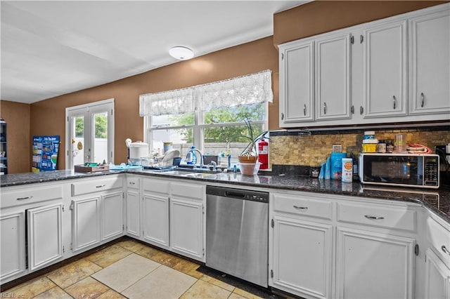 1236 Ginger Crst, Virginia Beach, VA 23453 - kitchen with black microwave, stainless steel dishwasher, tasteful backsplash, and white cabinetry