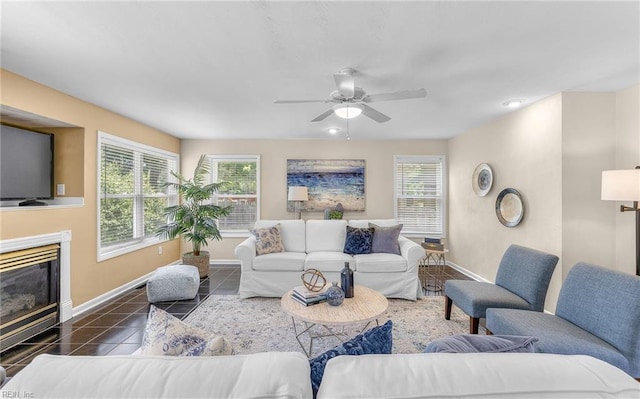 1304 Glen Burnie Ct, Virginia Beach, VA 23454 - living room featuring a glass covered fireplace, tile patterned flooring, and ceiling fan