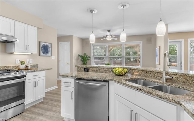 1304 Glen Burnie Ct, Virginia Beach, VA 23454 - kitchen featuring appliances with stainless steel finishes, white cabinetry, ceiling fan, and pendant lighting