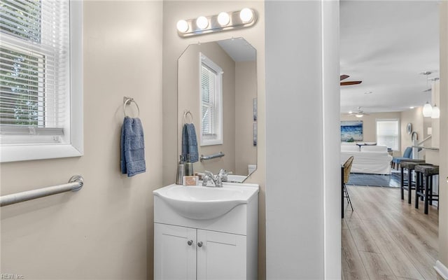 1304 Glen Burnie Ct, Virginia Beach, VA 23454 - bathroom featuring vanity, ceiling fan, and wood finished floors