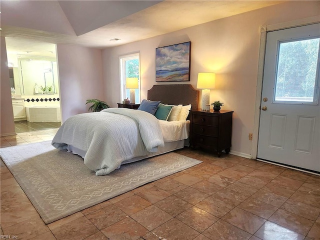1304 Glen Burnie Ct, Virginia Beach, VA 23454 - bedroom with connected bathroom and stone finish flooring