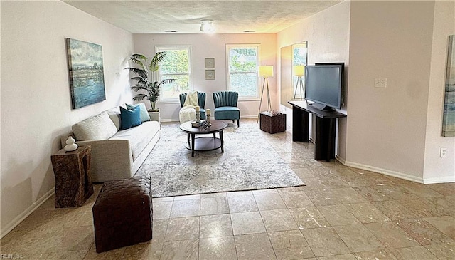 1304 Glen Burnie Ct, Virginia Beach, VA 23454 - living area with baseboards and a textured ceiling