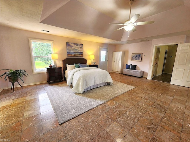 1304 Glen Burnie Ct, Virginia Beach, VA 23454 - bedroom featuring a tray ceiling, stone tile floors, and ceiling fan
