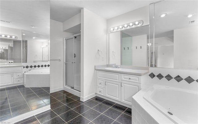 1304 Glen Burnie Ct, Virginia Beach, VA 23454 - bathroom featuring tile patterned flooring, two vanities, a whirlpool tub, and a shower stall