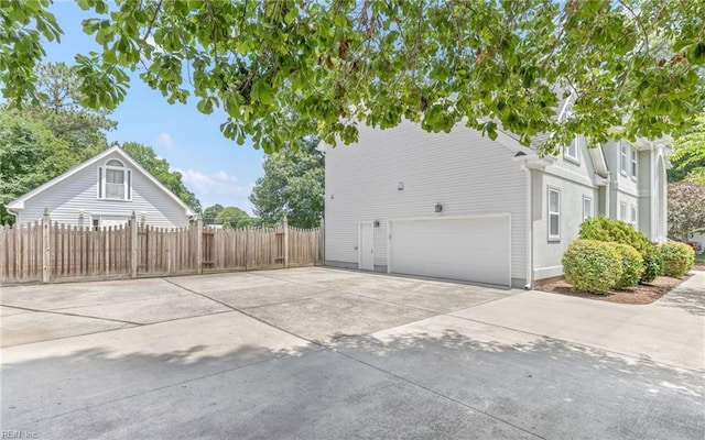 1304 Glen Burnie Ct, Virginia Beach, VA 23454 - view of property exterior with a garage and driveway