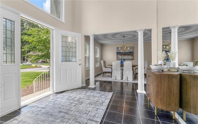 1304 Glen Burnie Ct, Virginia Beach, VA 23454 - foyer entrance with ornate columns, a chandelier, and a high ceiling