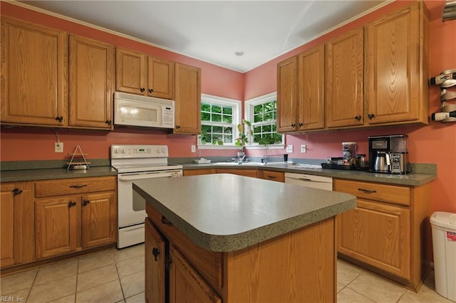418 Rolling Hills Dr, Williamsburg, VA 23185 - kitchen featuring white appliances, light tile patterned floors, brown cabinetry, and dark countertops