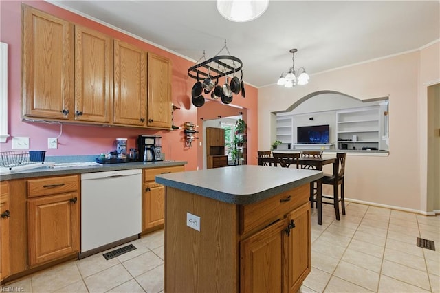 418 Rolling Hills Dr, Williamsburg, VA 23185 - kitchen featuring dishwasher, dark countertops, light tile patterned floors, crown molding, and brown cabinets
