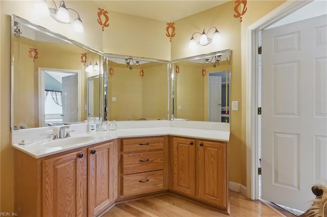 418 Rolling Hills Dr, Williamsburg, VA 23185 - bathroom featuring wood finished floors and vanity