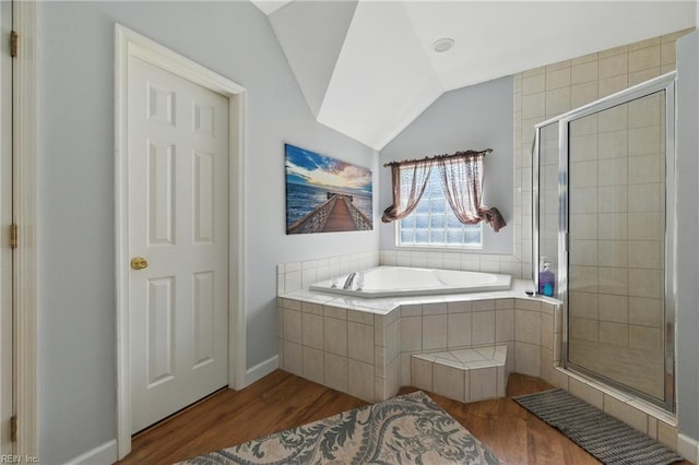418 Rolling Hills Dr, Williamsburg, VA 23185 - full bath featuring a bath, a stall shower, vaulted ceiling, and wood finished floors