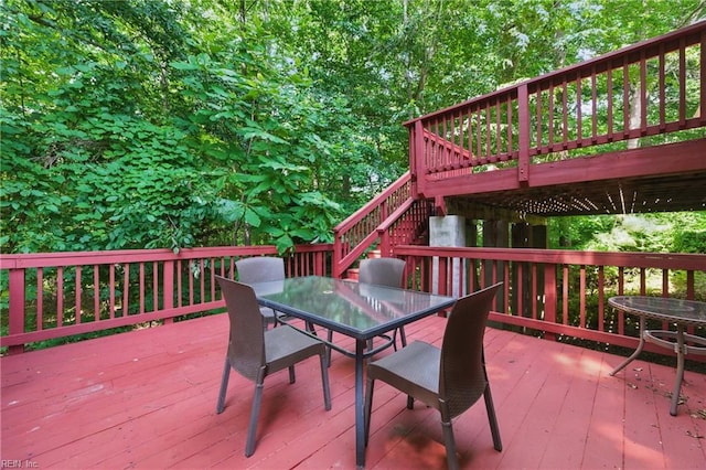 418 Rolling Hills Dr, Williamsburg, VA 23185 - wooden deck with outdoor dining area and stairway