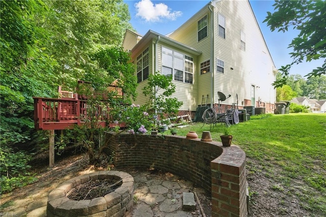 418 Rolling Hills Dr, Williamsburg, VA 23185 - view of patio featuring a fire pit and a wooden deck