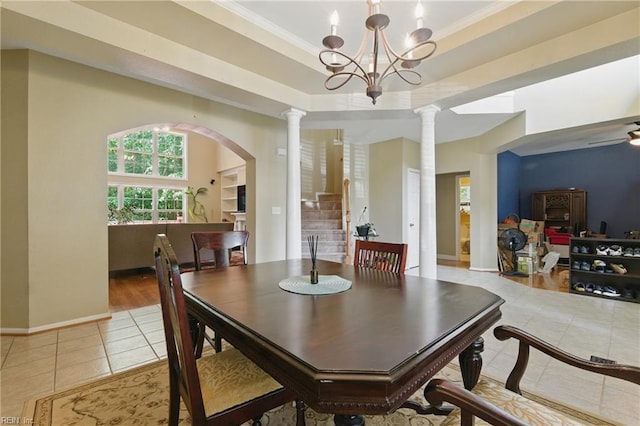 418 Rolling Hills Dr, Williamsburg, VA 23185 - dining area with light tile patterned floors, decorative columns, stairs, a chandelier, and ornamental molding