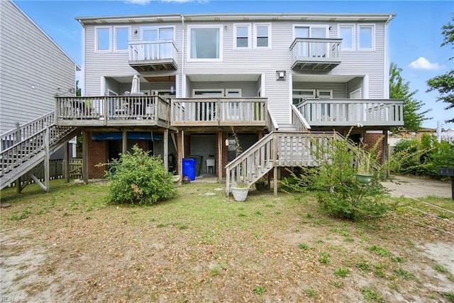 1039 Little Bay Ave, Norfolk, VA 23503 - rear view of house featuring stairs and a wooden deck