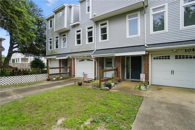 1039 Little Bay Ave, Norfolk, VA 23503 - view of property with concrete driveway, brick siding, and a front yard