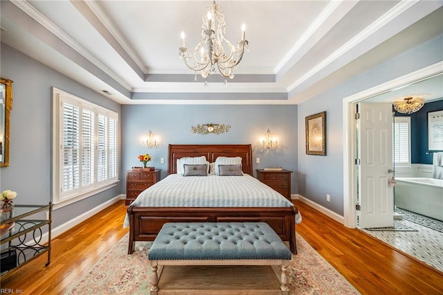 6003 Spinnaker Cove Ct, Suffolk, VA 23435 - bedroom with a chandelier, a raised ceiling, light wood-style flooring, and crown molding