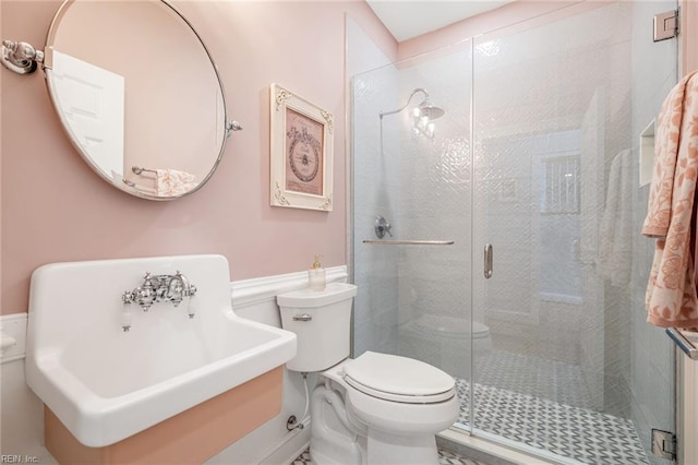 6003 Spinnaker Cove Ct, Suffolk, VA 23435 - bathroom featuring a wainscoted wall and a shower stall